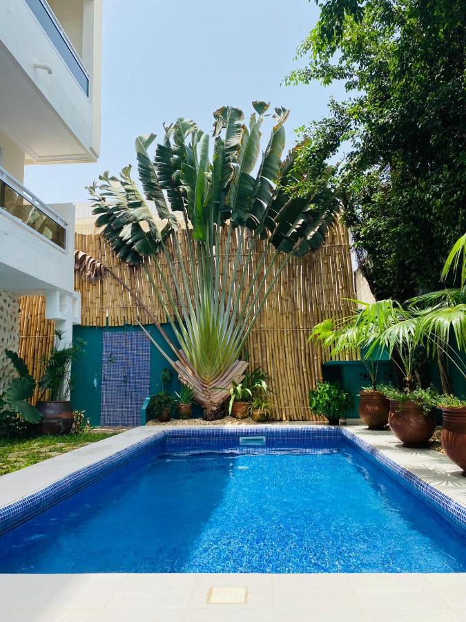 L'Oasis Guesthouse Cotonou Exterior foto