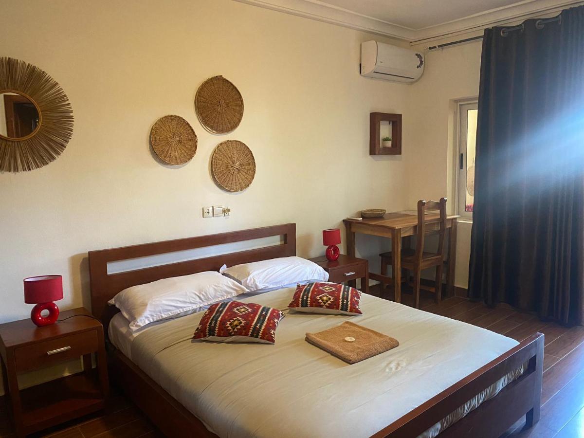 L'Oasis Guesthouse Cotonou Exterior foto
