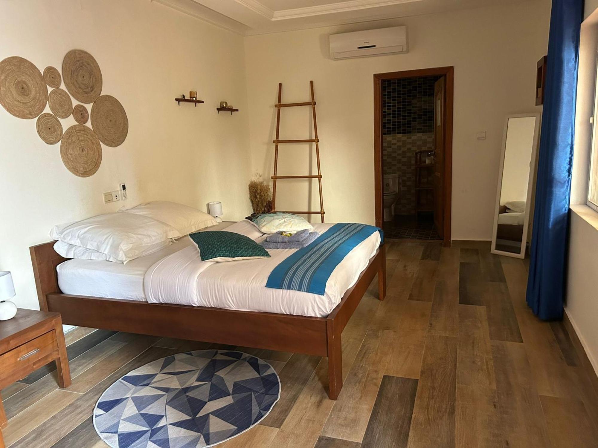 L'Oasis Guesthouse Cotonou Exterior foto