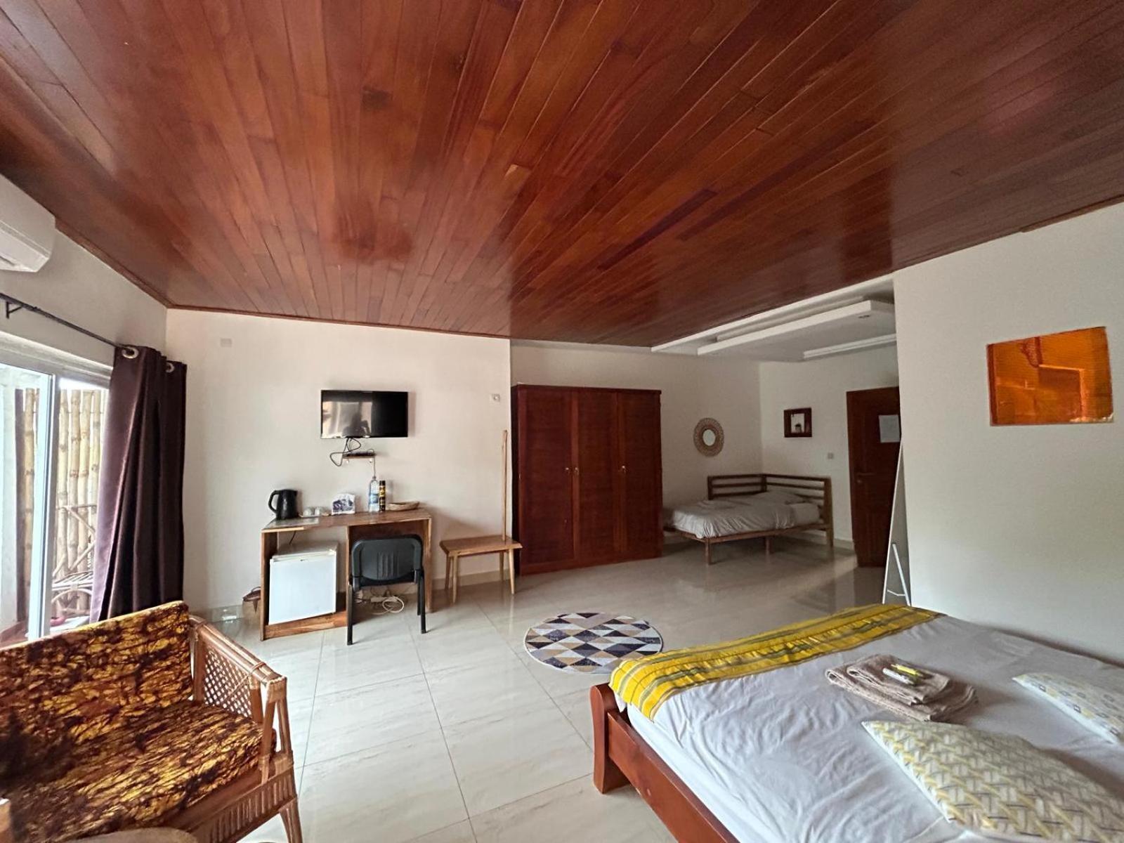 L'Oasis Guesthouse Cotonou Exterior foto