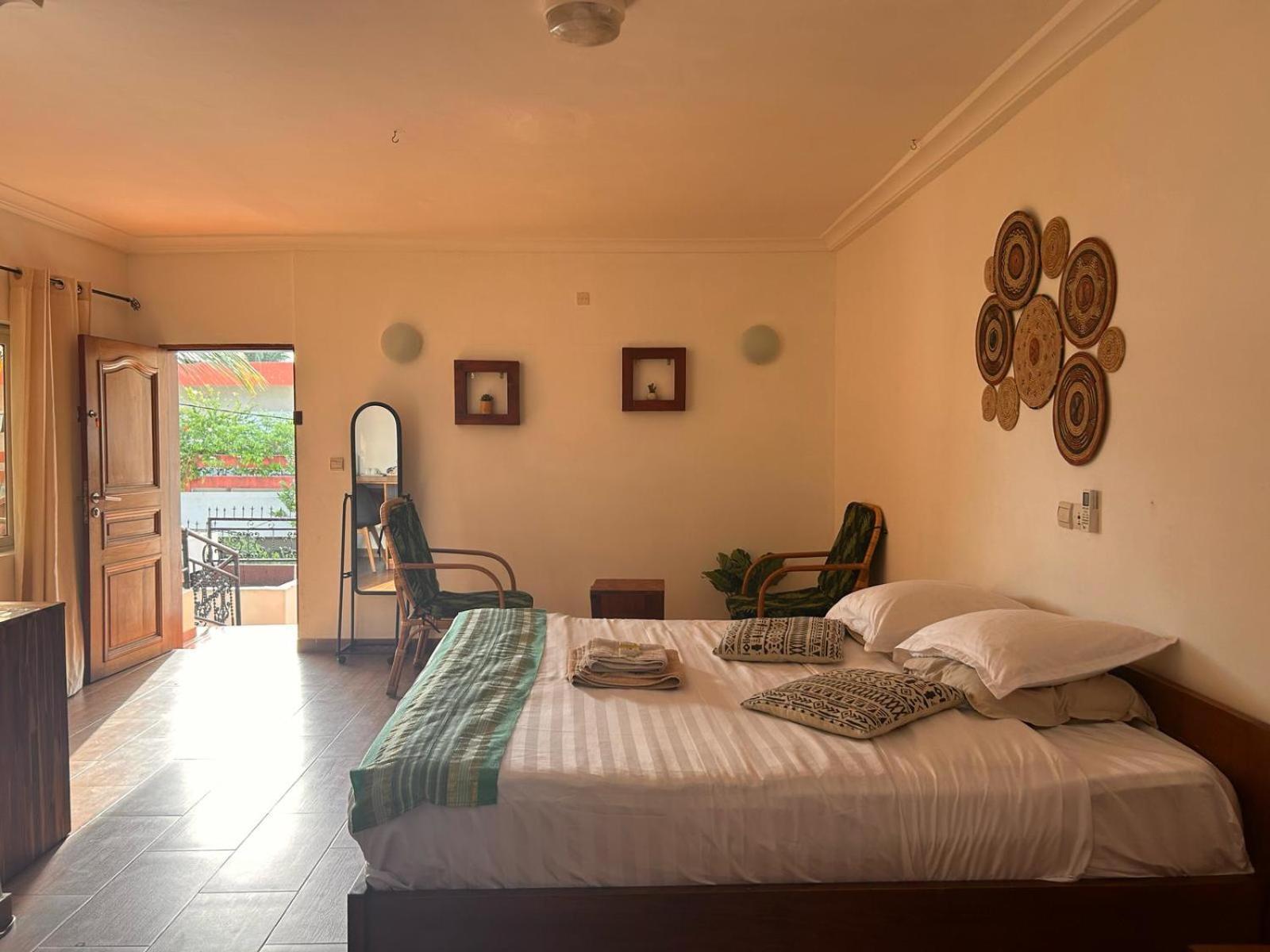 L'Oasis Guesthouse Cotonou Exterior foto